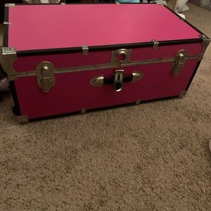 Pink wheeled trunk
